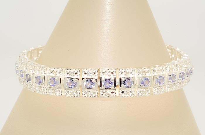 71CT ROUND CUT TANZANITE & WHITE TOPAZ BRACELET WOW  